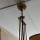 Vintage chandelier in gilded brass, chromed metal and plexiglass from the 1950s
