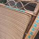 Rattan armchair with high back