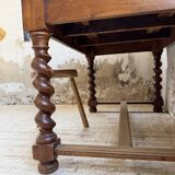 Paneled walnut desk with turned legs, 1900