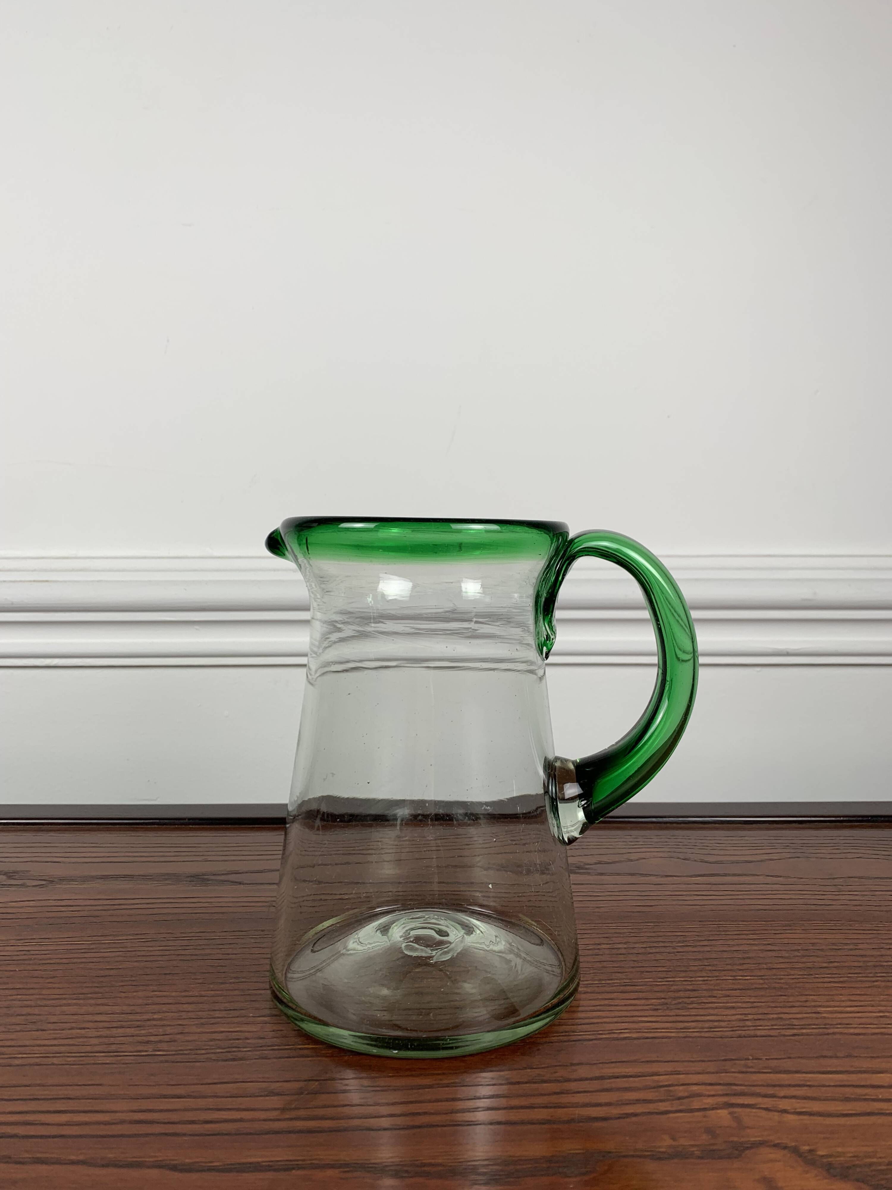 Vintage blown glass jug, green border