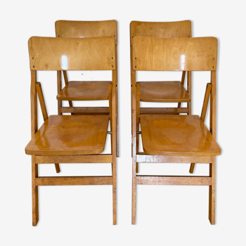 Série de 4 chaises chauffeuses en bois pliantes, années 1950