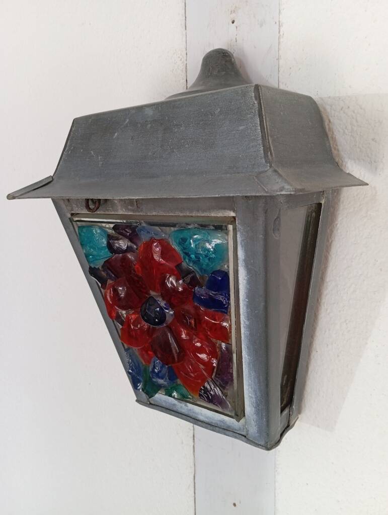 Zinc and colored glass wall light