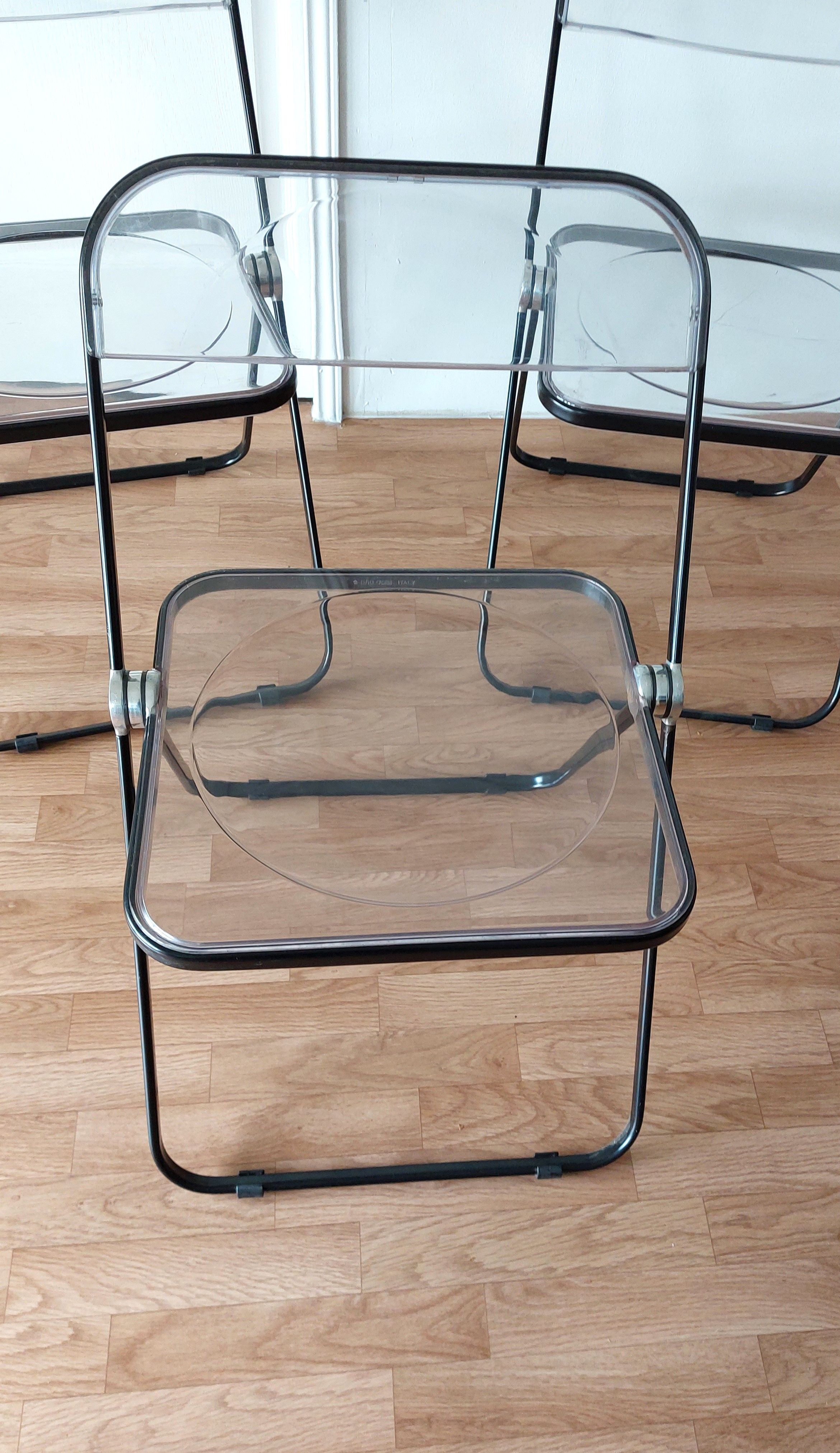 Series of 3 black and transparent Plia chairs Giancalo Piretti for Castelli, 1980.