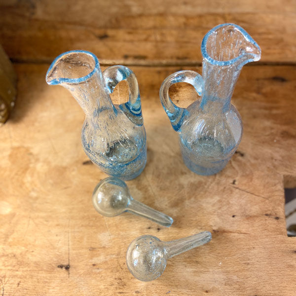 Pair of blue bubbled blown glass decanters