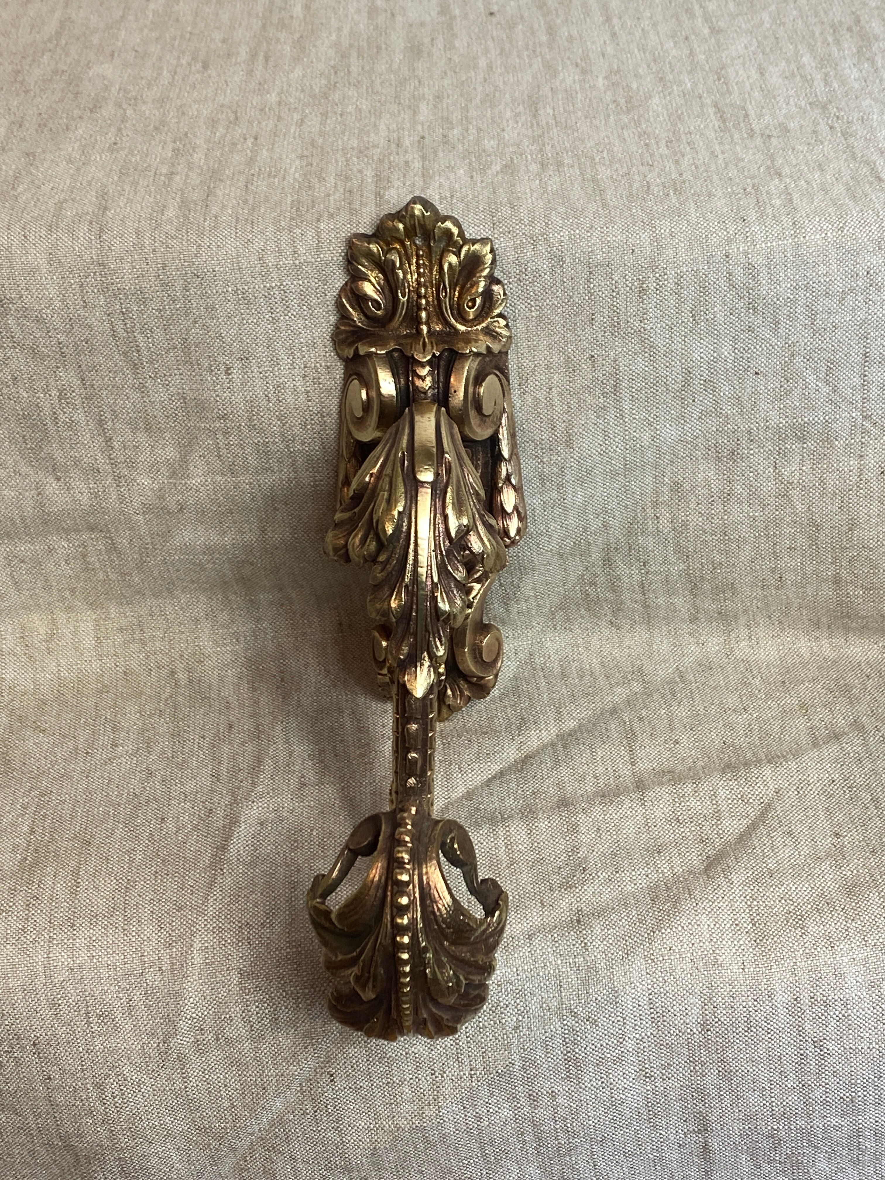 Golden bronze coat hook, 19th century