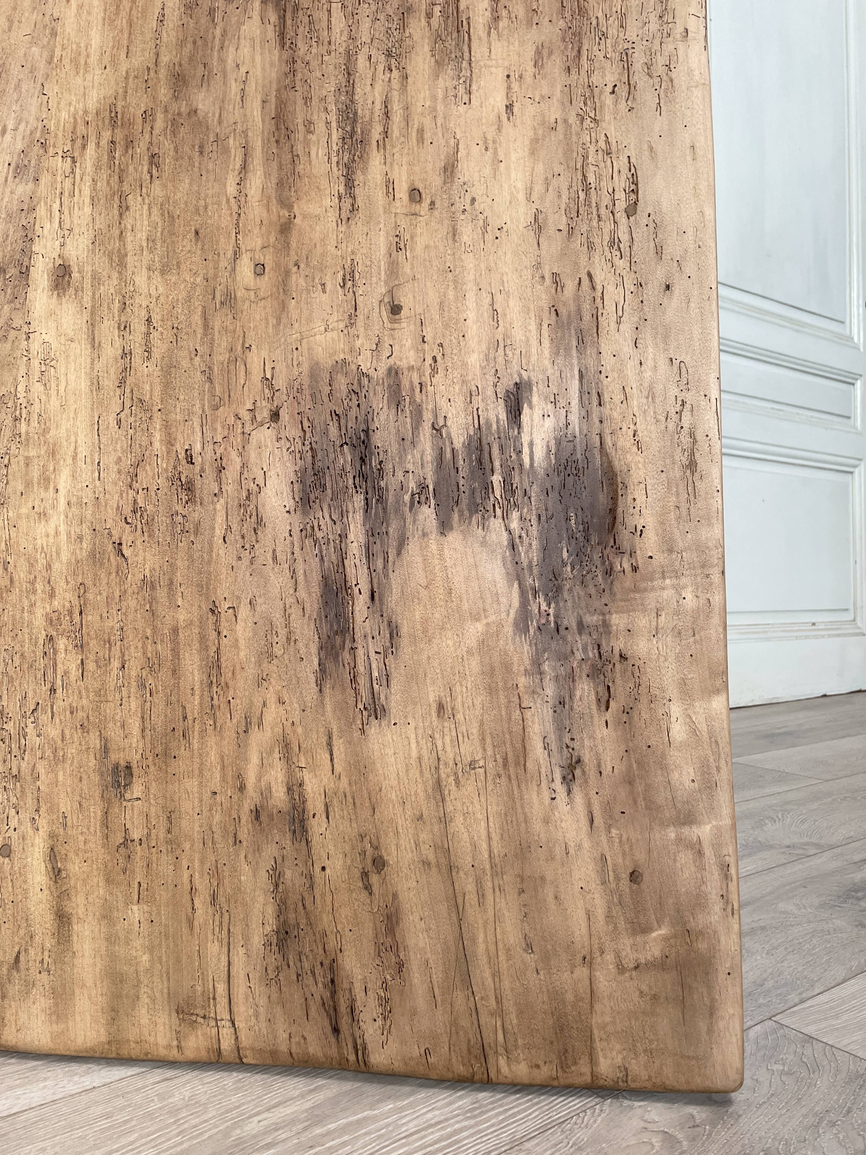 Vintage farm table with spindle legs.