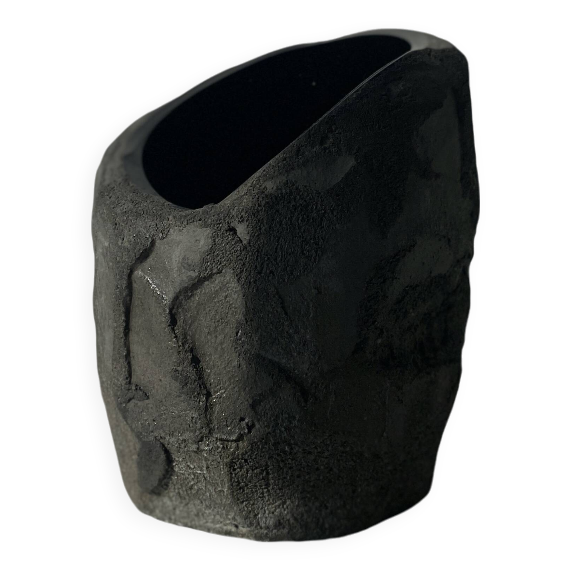 Asymmetrical sculpted concrete vase