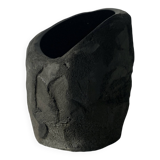Asymmetrical sculpted concrete vase