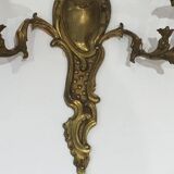 Pair of Louis XV style bronze wall sconces