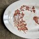 Longwy oval dish in white and brown iron earth