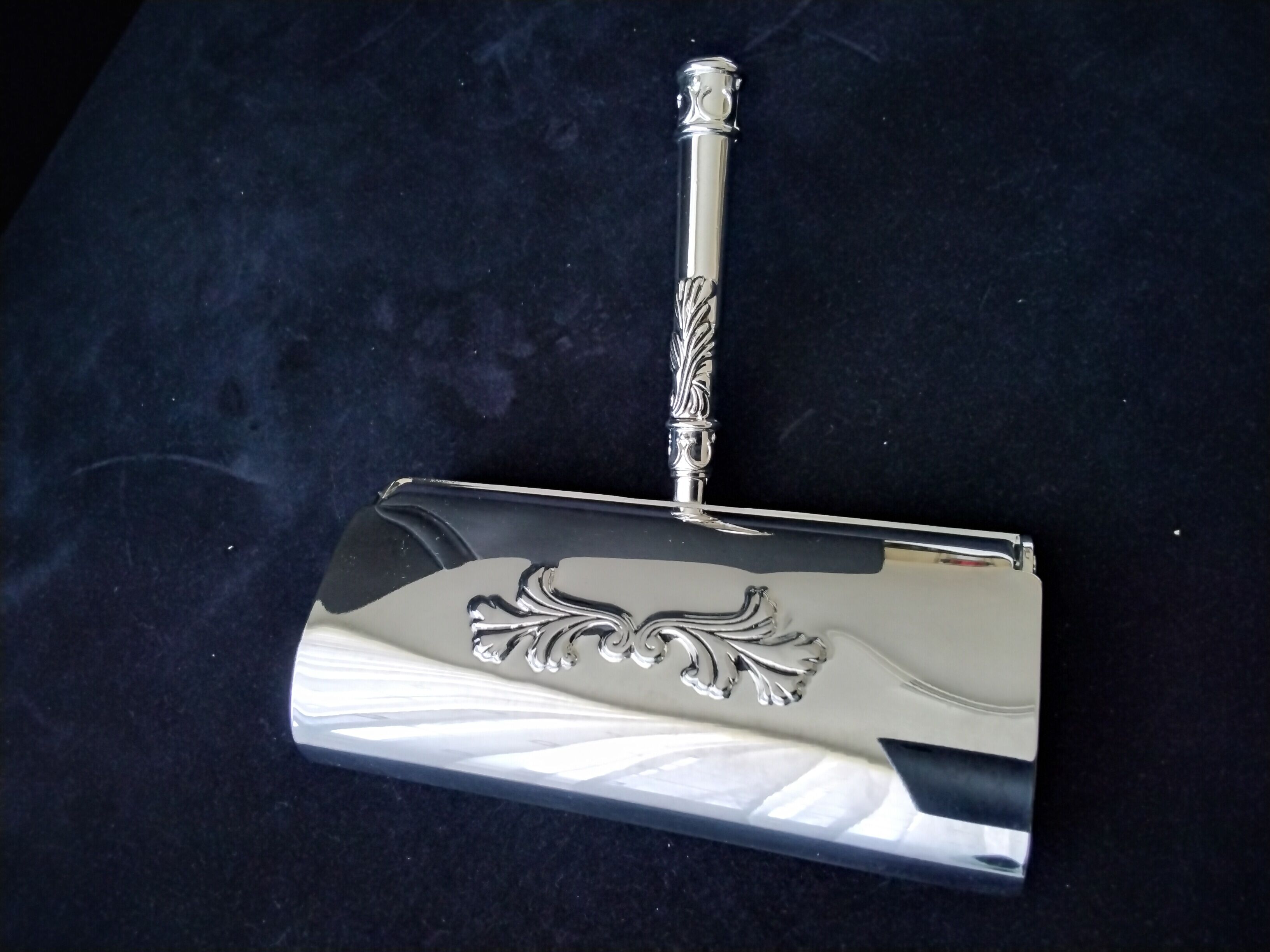 Silver metal roller crumb picker