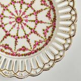 Pair of openwork porcelain plates decorated with roses
