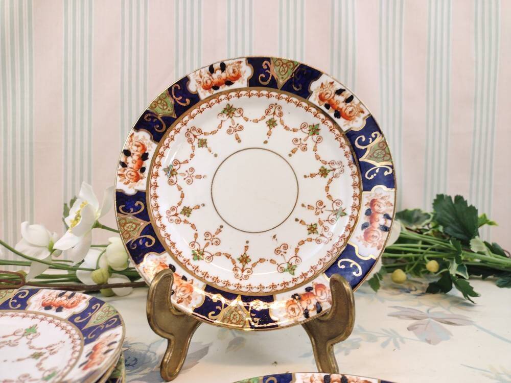 6 Royal Stafford tea plates