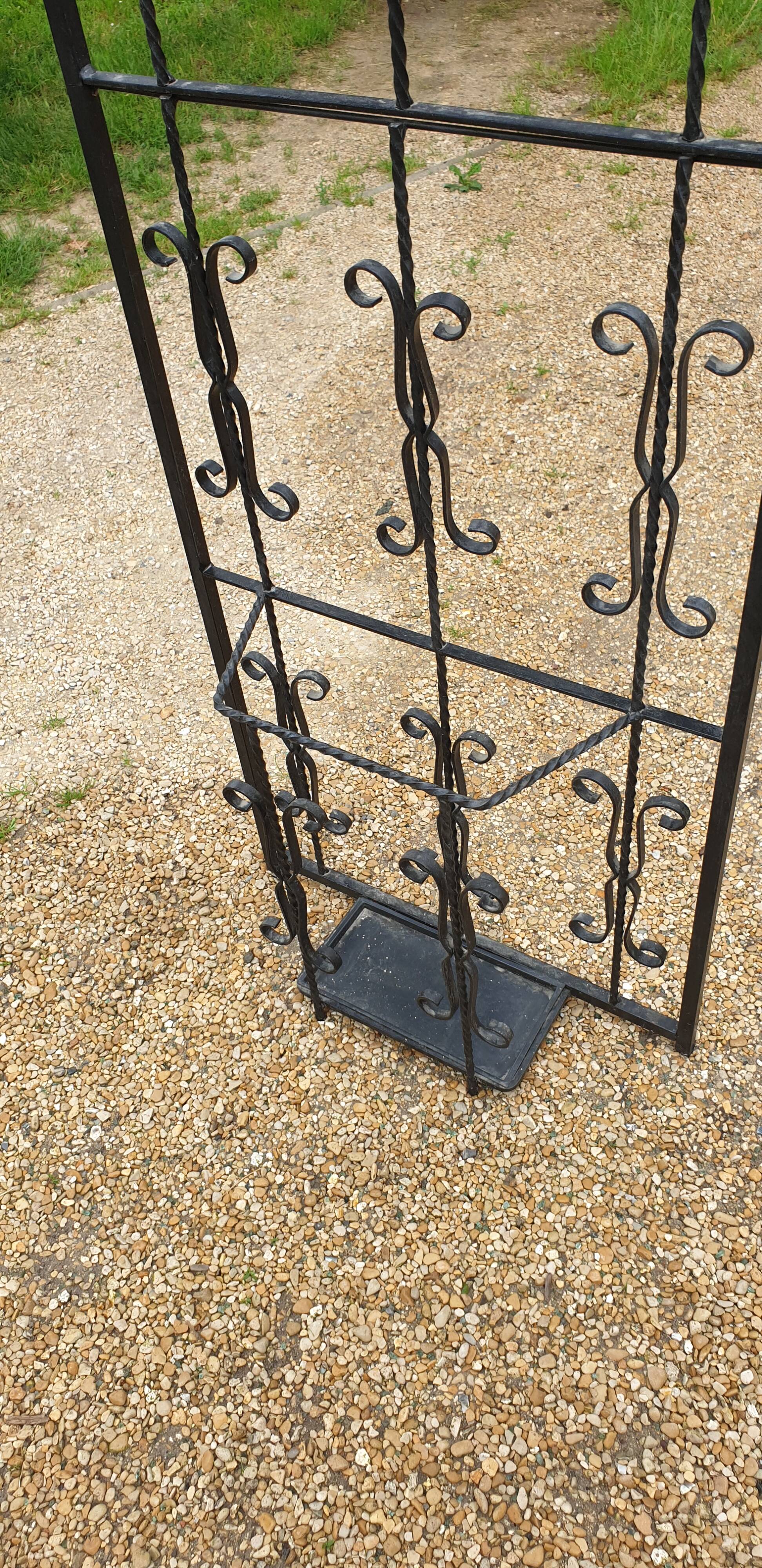 Wrought iron coat holder
