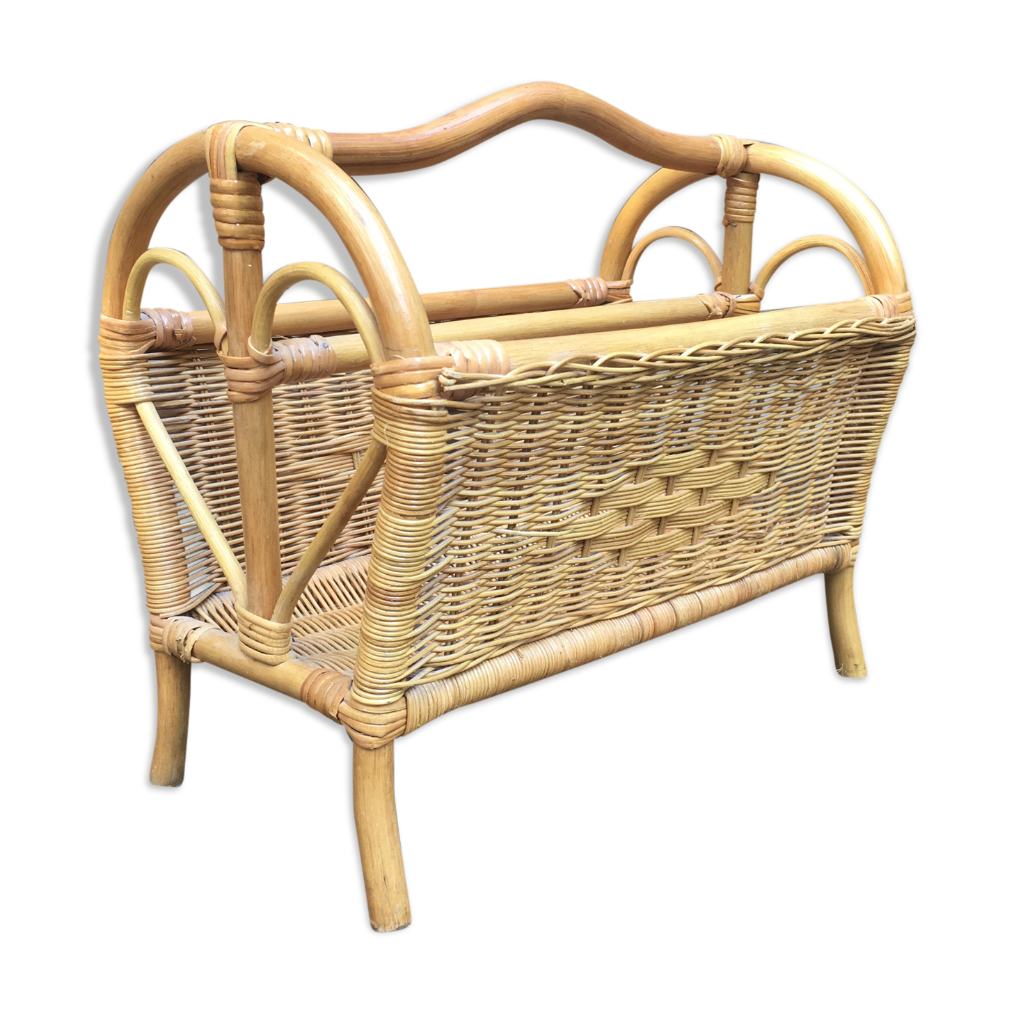Old rattan magazine rack