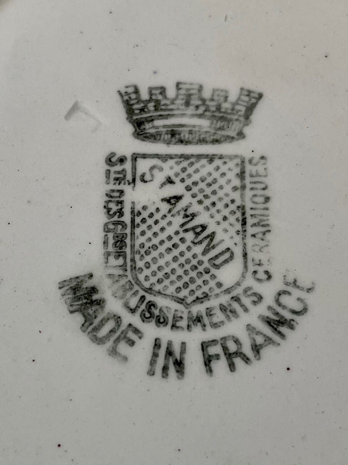 Flat faience plates from saint amand and hamage