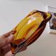 Vintage amber Duralex ashtray from the 1970s.