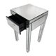 Bedside table covered with beveled mirrors on all sides