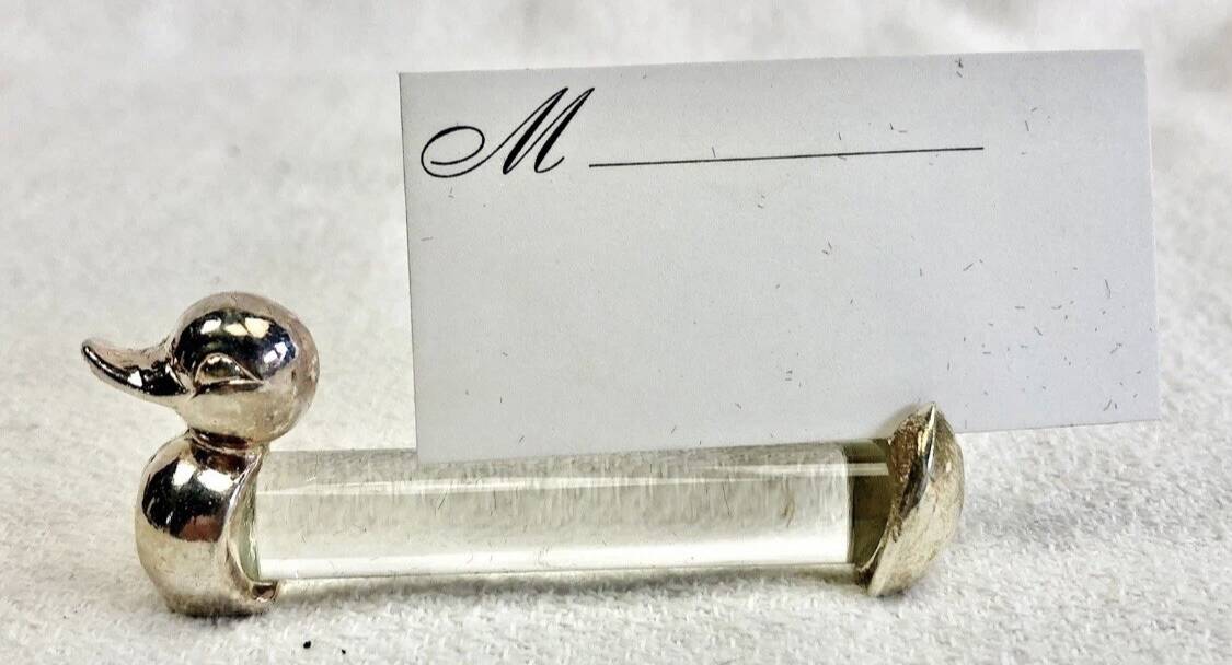 12 silver-plated metal duck knife rests with crystal.