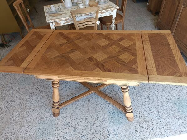 Table avec rallonges intégrées rénovée