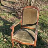 Antique Voltaire armchair in wood and green velvet Louis Philippe