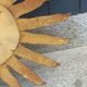 Miroir soleil en bois et stuc doré, années 50