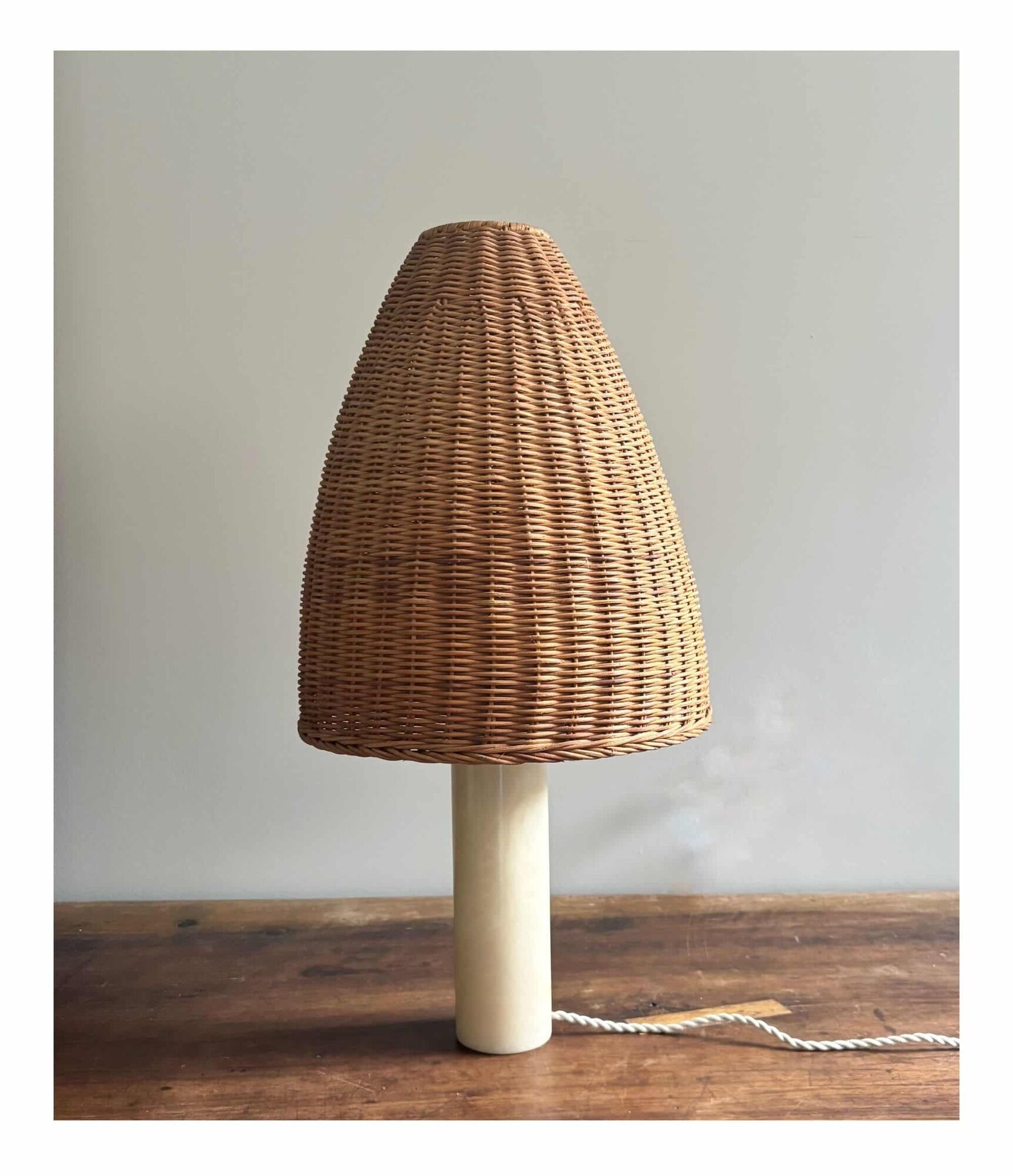 Vintage alabaster table lamp, soft yellow/cream, wicker shade