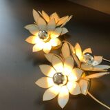 Pair of Hollywood Regency flower sconces in white glass and brass. Italy