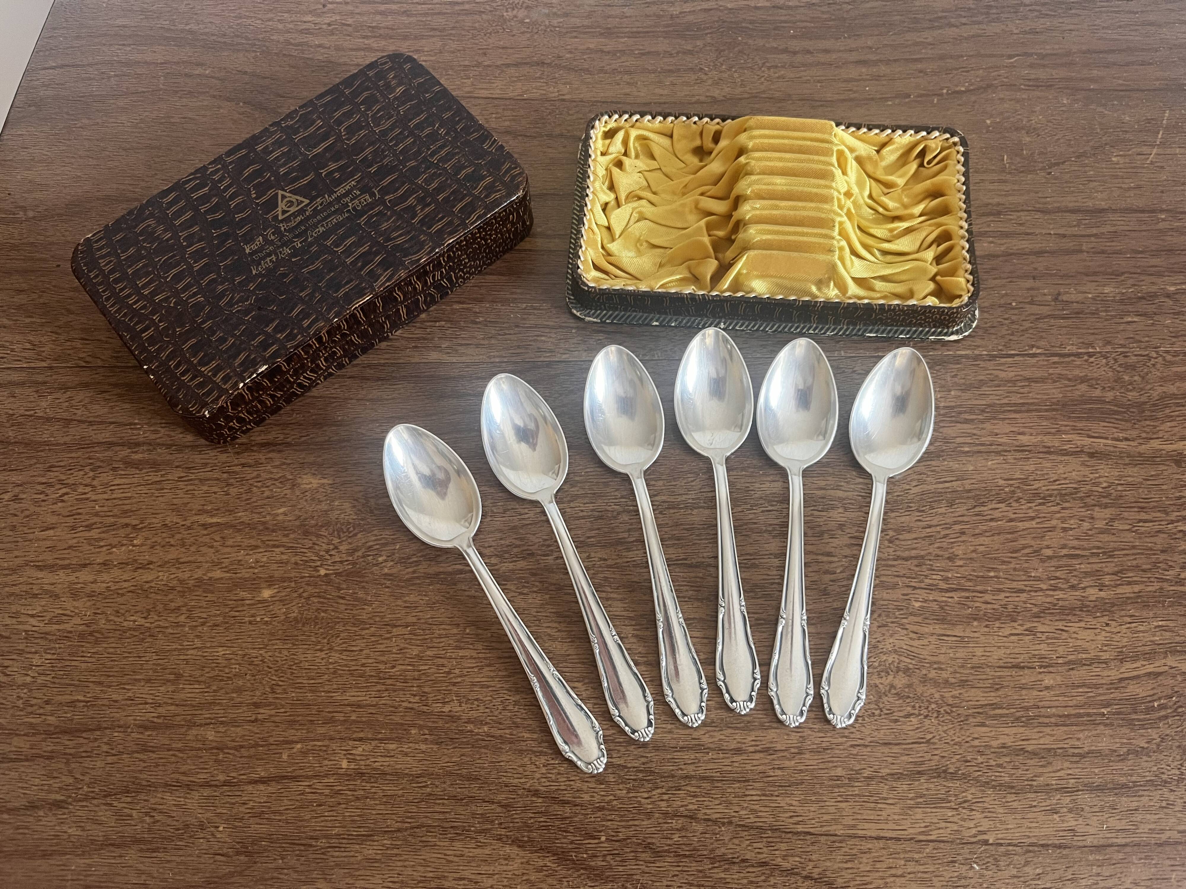Small silver-plated metal spoons