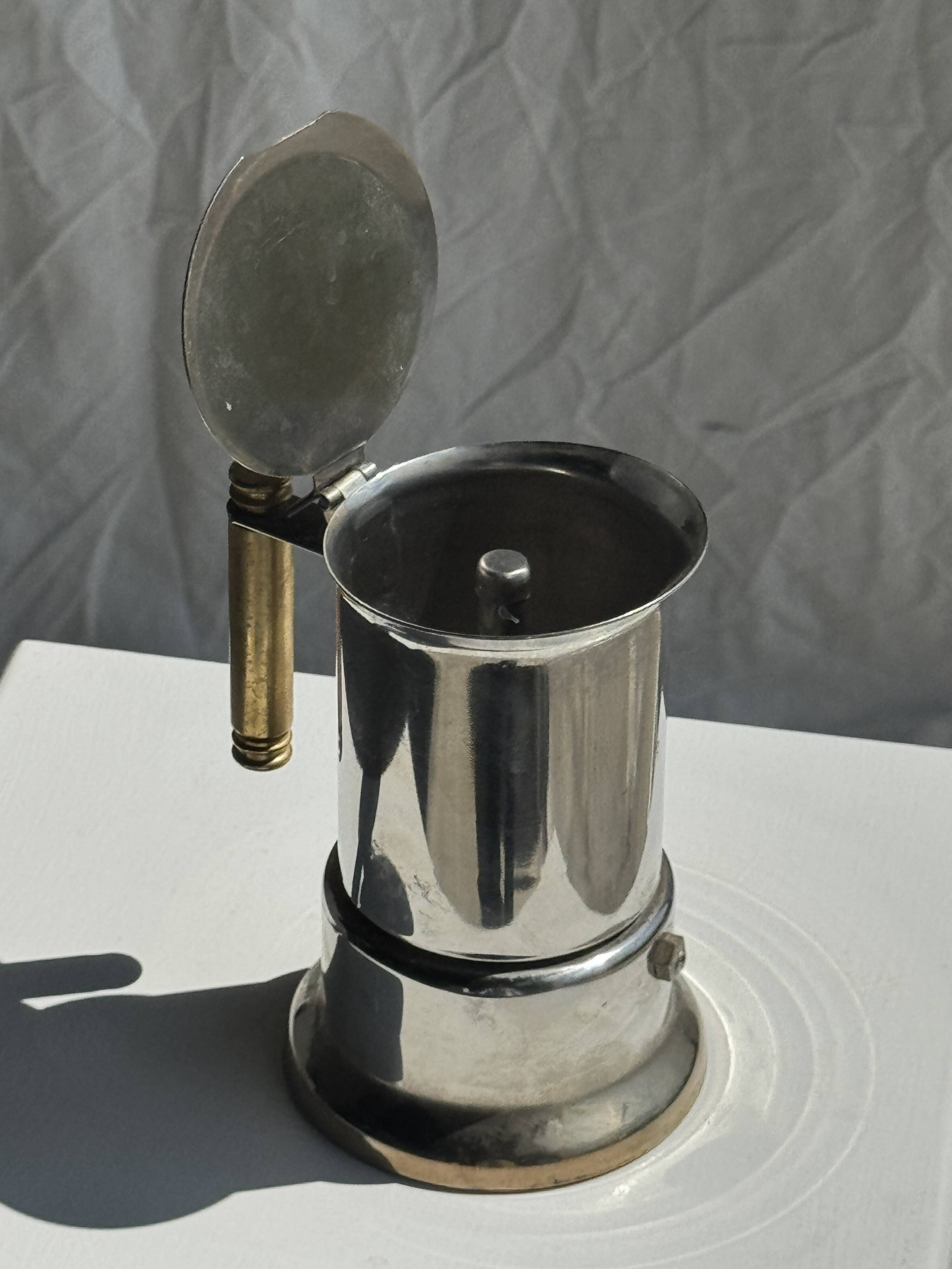 Small silver and gold Italian coffee maker Alpu-F Puppieni in stainless steel