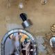 Pair of vintage adjustable wall sconces in brushed metal