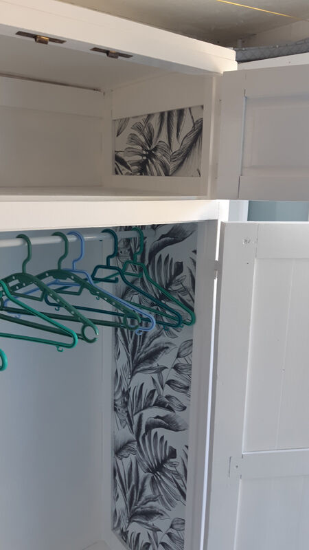 Vintage wardrobe in white wood