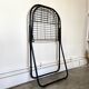 Black metal folding chair