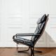 Siesta armchair and black leather ottoman by Ingmar Relling for Westnofa, Norway.