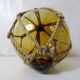 Boule de verre flotteur jaune ambré vintage