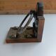 Medieval-style bookends, antique door handle.