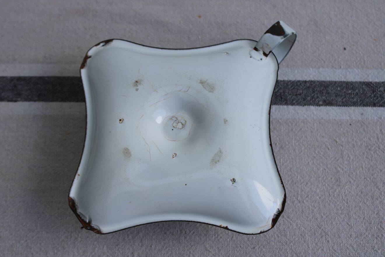 Antique enamel candle holder