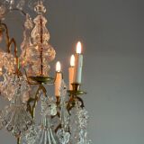 Bronze cage chandelier adorned with molded glass pendants in the shape of peacock feathers, circa 1800