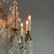 Bronze cage chandelier adorned with molded glass pendants in the shape of peacock feathers, circa 1800