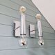 Pair of tubular double-light wall lights in chrome-plated metal, 1970s