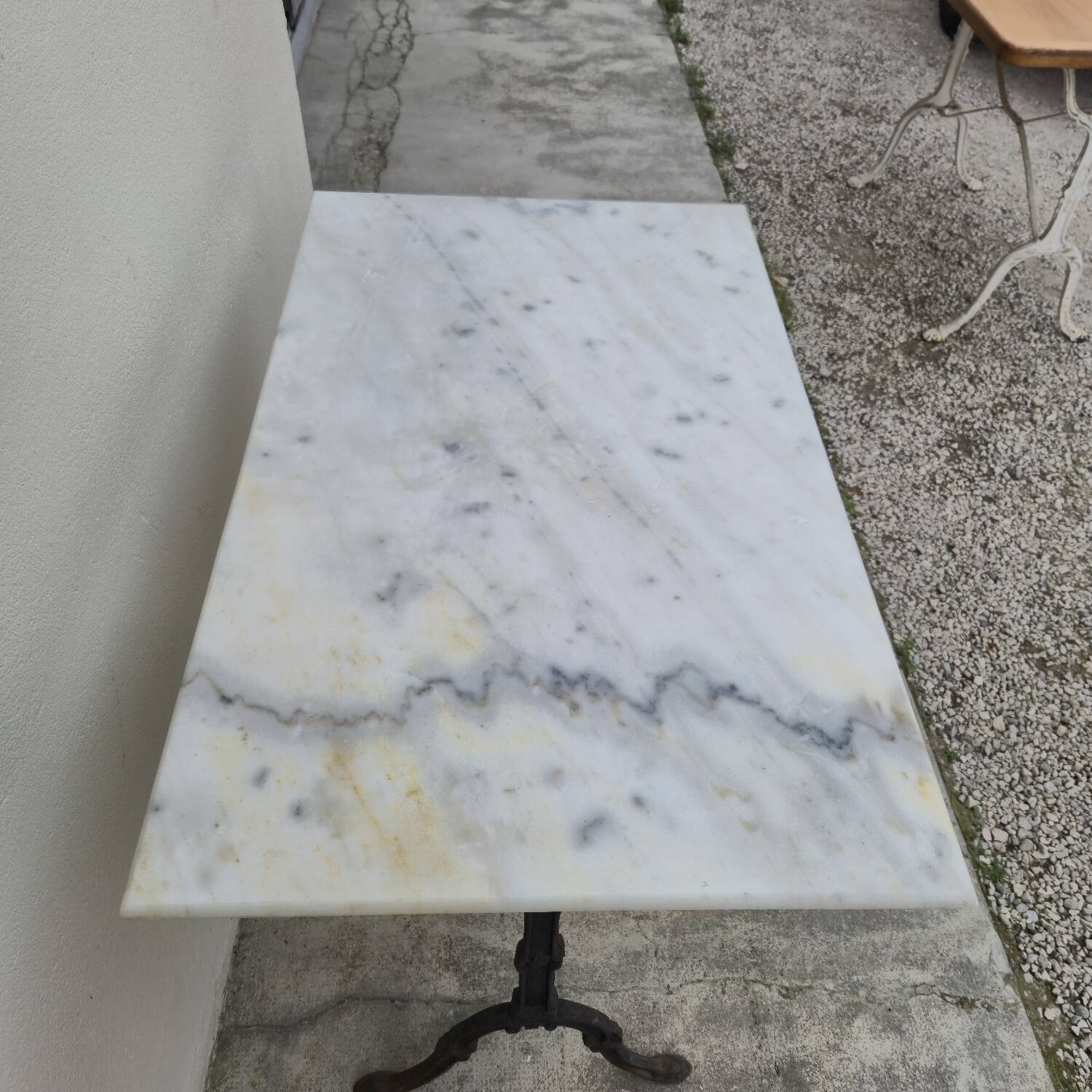 Antique cast iron and marble bistro restaurant table