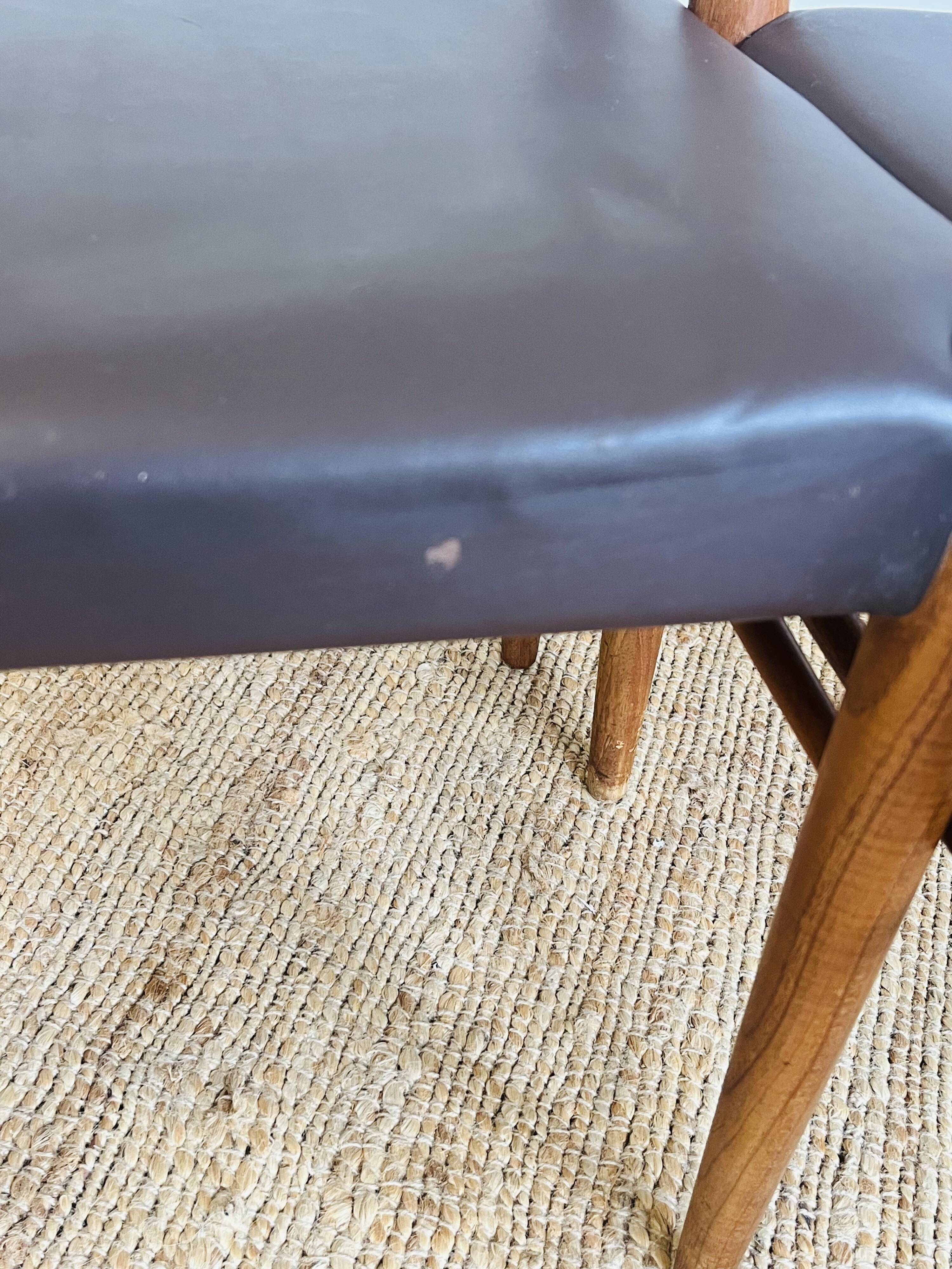 3 vintage Scandinavian chairs in teak and brown leatherette