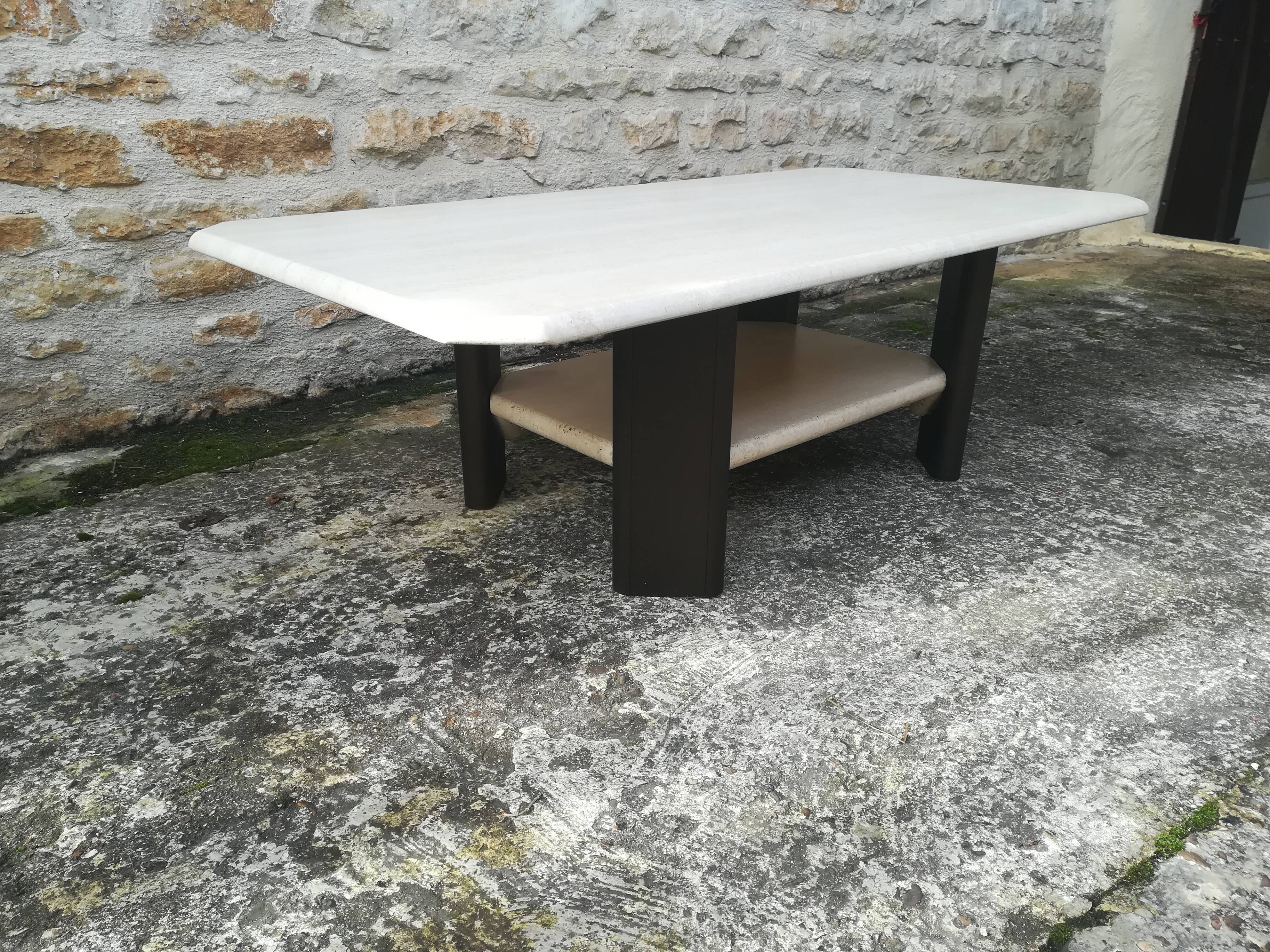 Low table in travertine and aluminium