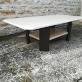 Low table in travertine and aluminium