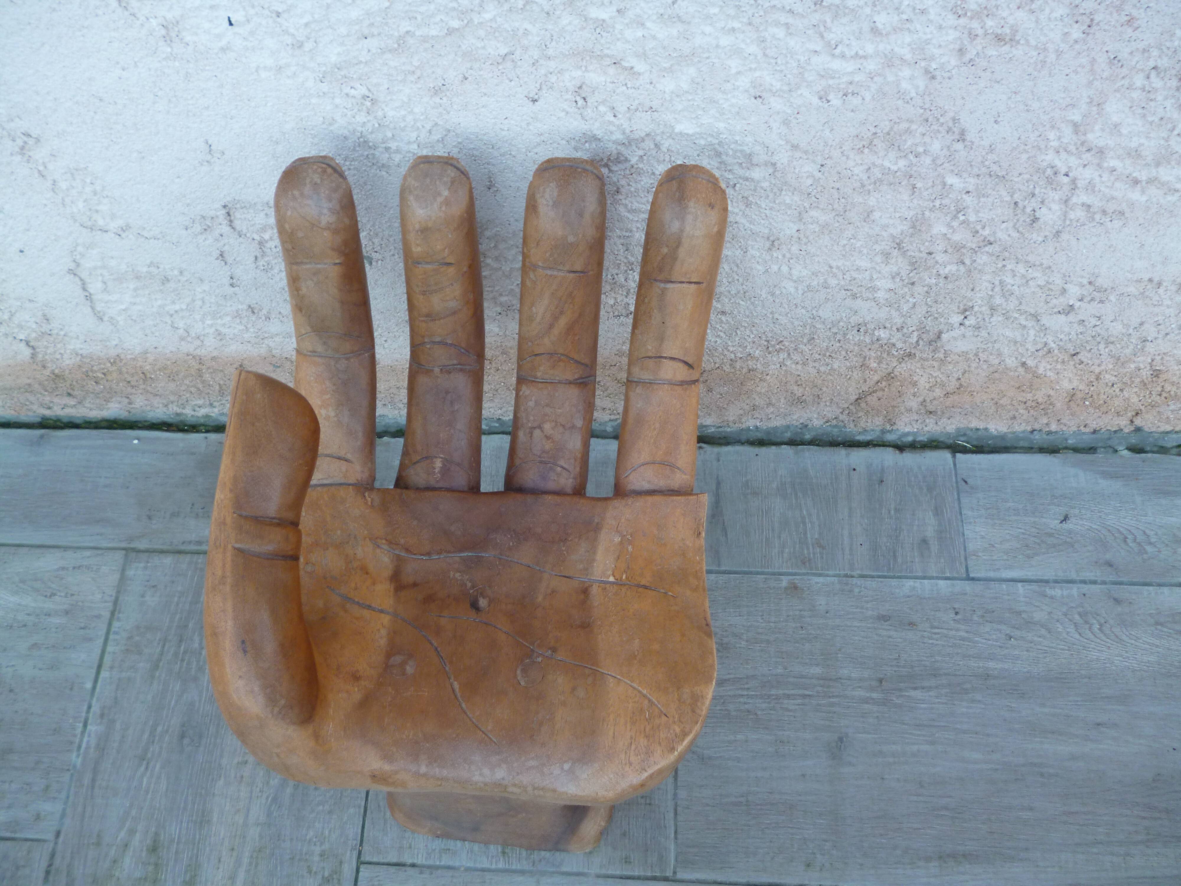 Vintage wooden hand-shaped chair