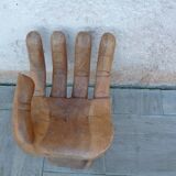 Vintage wooden hand-shaped chair