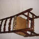 Old chair covered Leopard fabrics