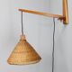Mid-century adjustable wooden wall light with rattan shade, 1970s