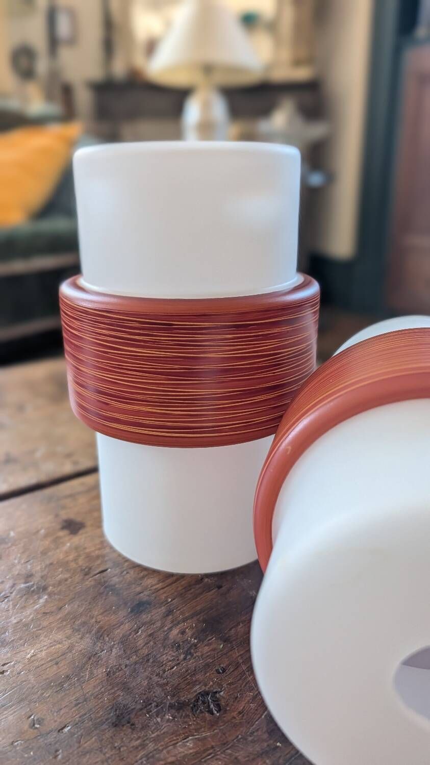 Pair of opaline lampshades, wood imitation decor from the 60s.