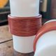Pair of opaline lampshades, wood imitation decor from the 60s.